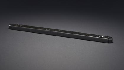 Black metal bar with screw holes at either end