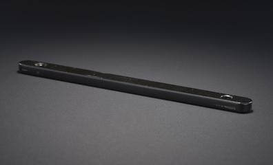 Black metal bar with screw holes at either end