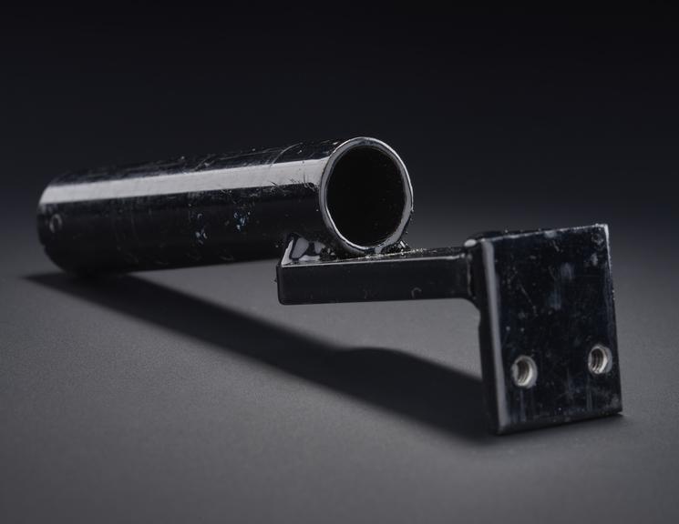 Tube with attached bracket