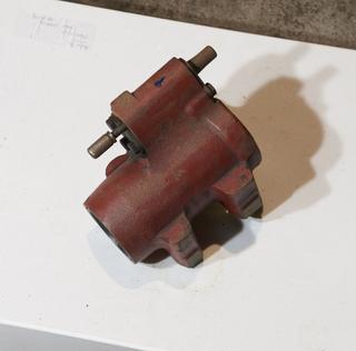 Red painted cast steel pump component, inscribed with: ‘C. E. G. B.’, and ‘1/’, from Massey-Ferguson type 780 combine harvester thresher J 3162 C