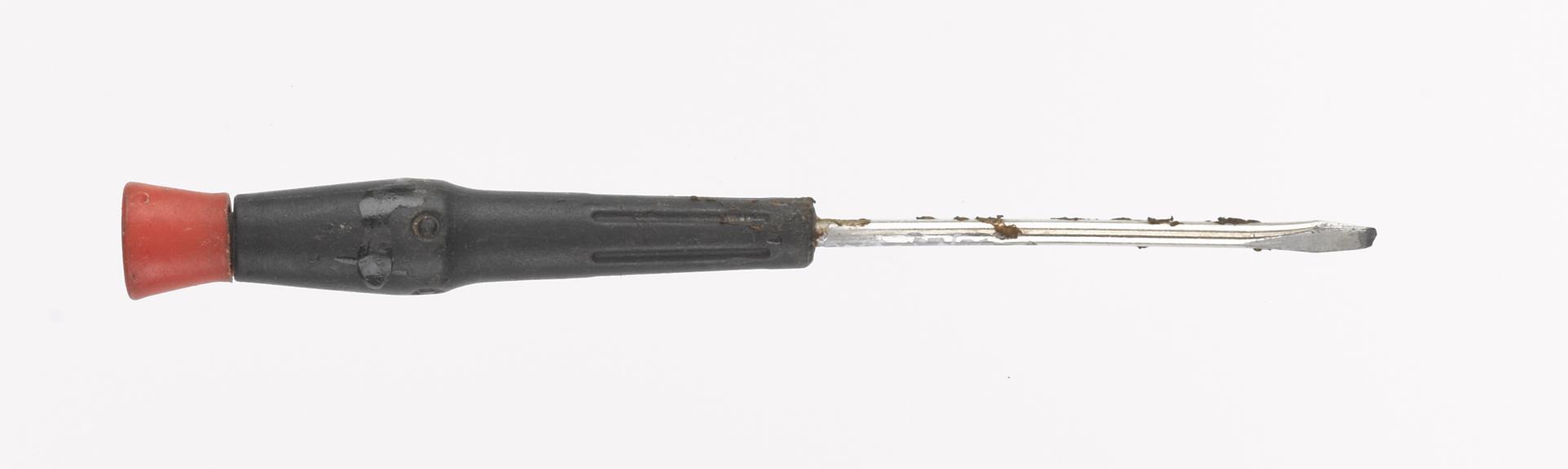 Flat head screwdriver (from mobile phone repair workshop)