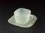 Square picnic cup and saucer of pale green polyethylene