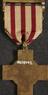 Gilt and enamel medal with silk ribbon