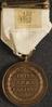 Bronze medal with silk ribbon