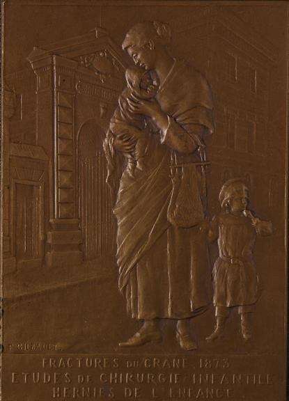 Three rectangular bronze medals commemorate the work of Felizet