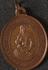 Oval copper medal