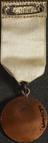 Medal, bronze with white silk ribbon