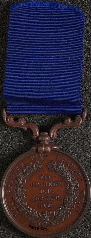 Circular bronze medal with blue ribbon