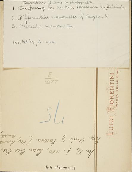 Photograph of Delenil's Reciprocating Vacuum Punch and two manometers