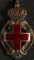 Oval enamelled elaborate Red Cross brooch with crown surmounting