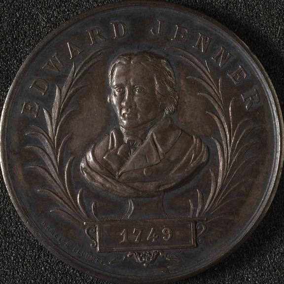 Circular silver medal