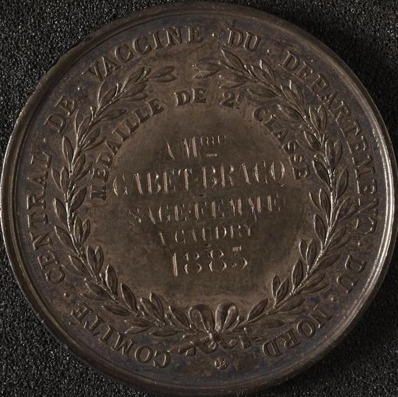 Circular silver medal