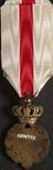 Gilt and enamel medal surmounted by crown and silk ribbon