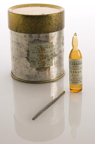 Two 1cc "Vaporole" ether ampoules with razor in tin