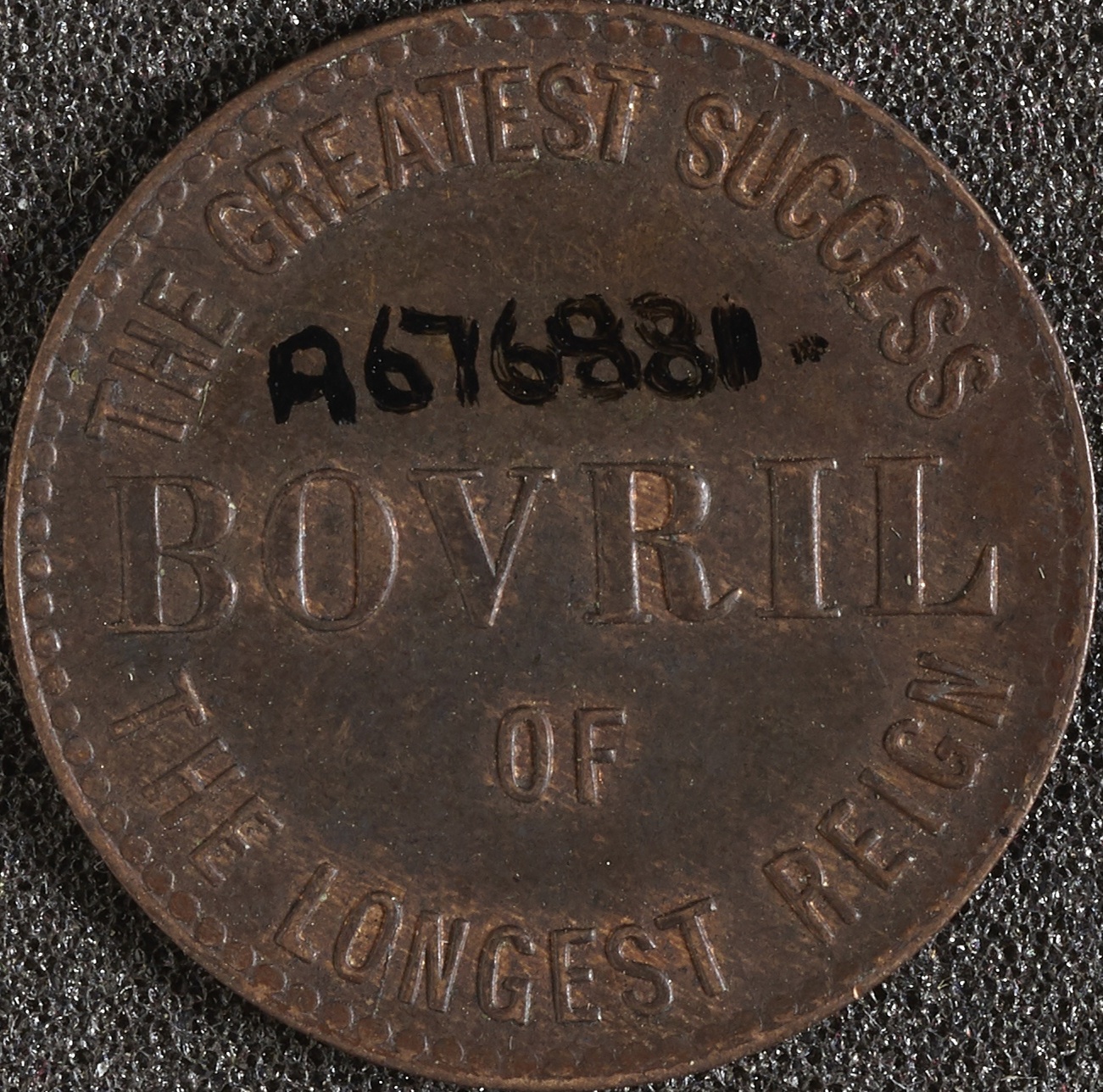 Bushnell Token Bronze advertisement token for