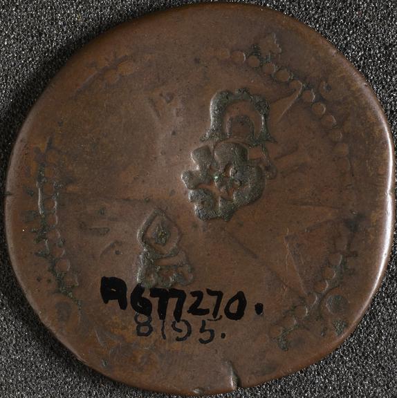Four tavi(?) bronze coin, associated with the Knig