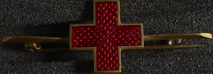 Gilt and enamel Red Cross lapel badge