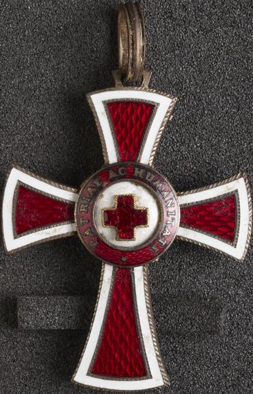 Silver and enamel lapel badge in form of red cross