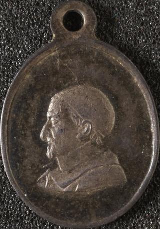 Small pendant oval shaped with suspension loop at top