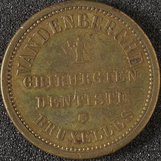 Brass trade token advertising the dental surgery of Vandenberghe at Brussels