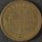 Brass trade token advertising the dental surgery of