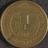 Brass trade token advertising the dental surgery of