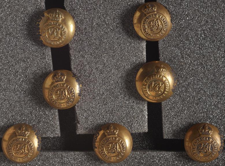 7 brass buttons of Royal Canadian Artillery