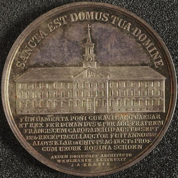 Silver medal commemorating building renovated and extended by