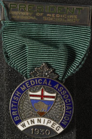 Silver and enamel membership badge