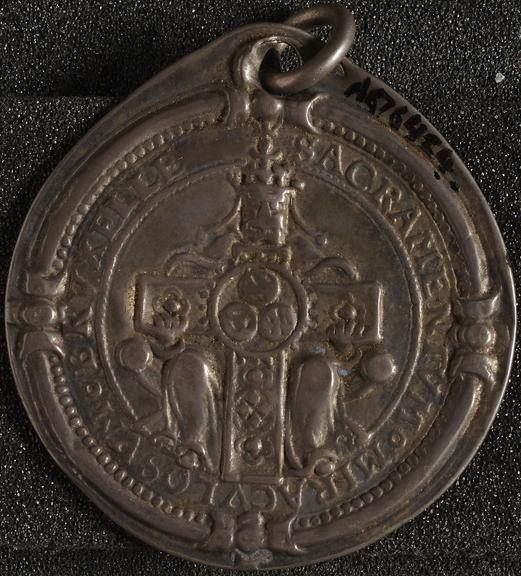 Silver pendant with cross and holy inscription