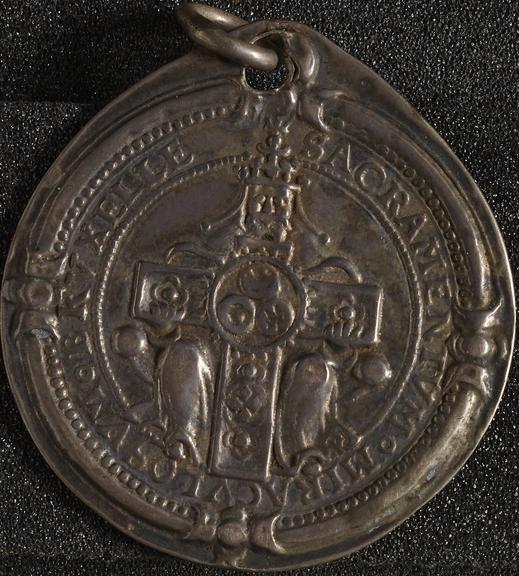 Silver pendant with cross and holy inscription