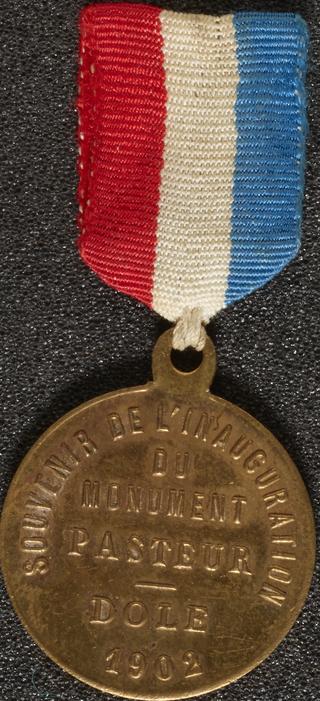Medal, brass, with ribbon