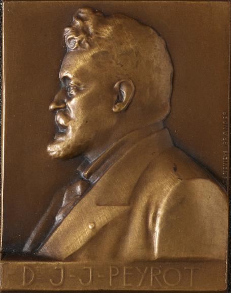 Small bronze plaque of Dr. Jean Joseph Peyrot