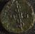 Small bronze coin with head of Hippocrates on obverse and