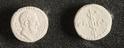 2 circular plaster casts of the 2 halves of a Greek coin