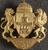 Gilt lapel badge in form of coat of arms supported by lion and