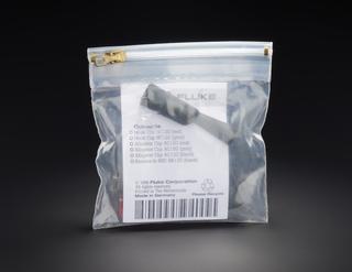 Zip-lock bag containing two black BB120 Banana to BNC sockets