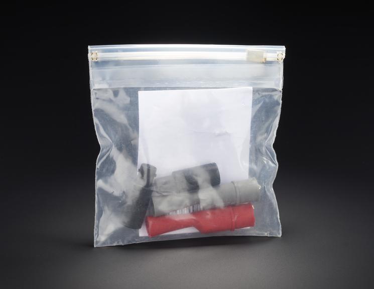 Zip-lock bag containing two black BB120 Banana to BNC sockets