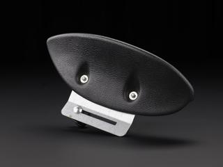 Black plastic support for wheelchair