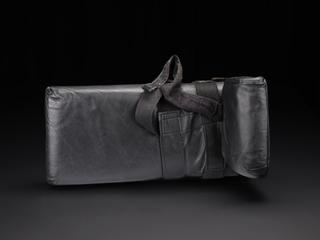 �L� shaped wheelchair headrest with support strap