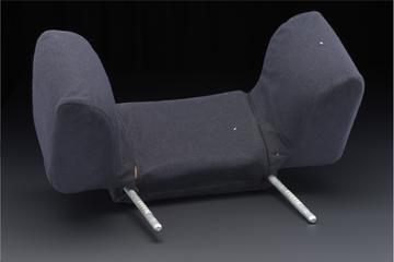 Wheelchair headrest with wing supports