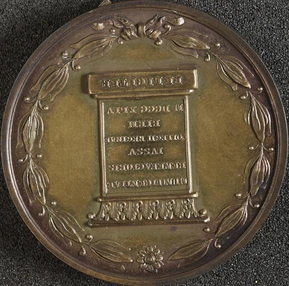 Circular silver medal