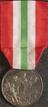 Silver medal with silk ribbon