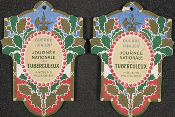 Two lapel badges