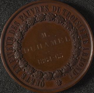 Copper medal designed by Caque