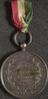 Silver medal with suspension loop and cloth ribbon