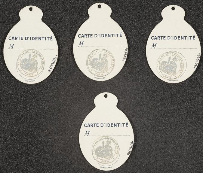 Four lapel badges