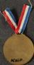 Gilt bronze medal with ribbon sold in aid of the war wounded