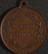 Circular copper medal or token