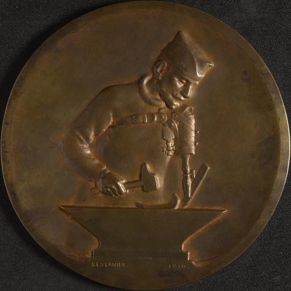 Plaque, mutilated soldier working as smith